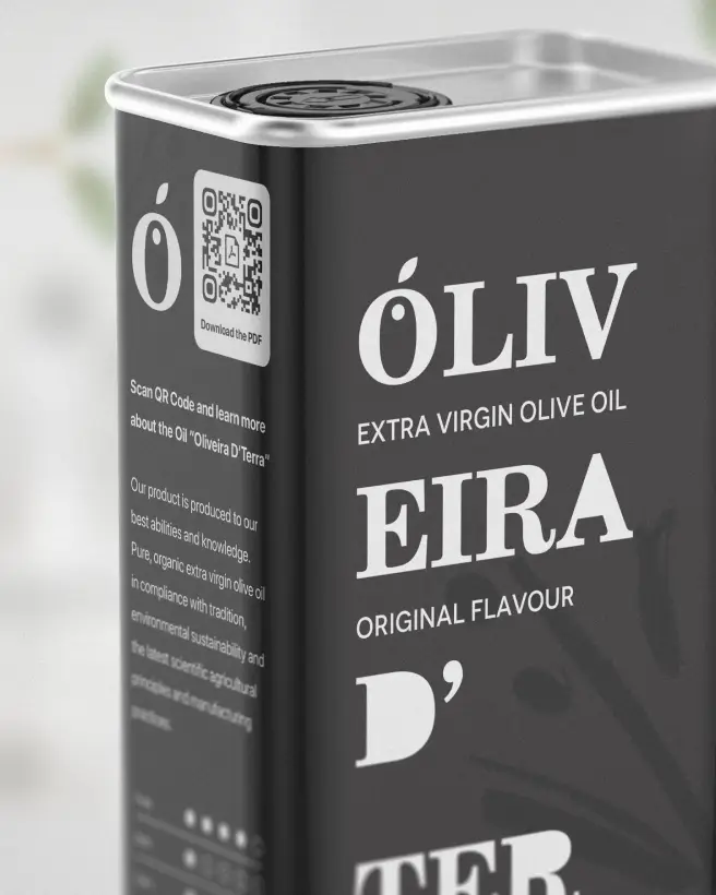 Closeup of a black olive oil tin with white writing and a QR Code.