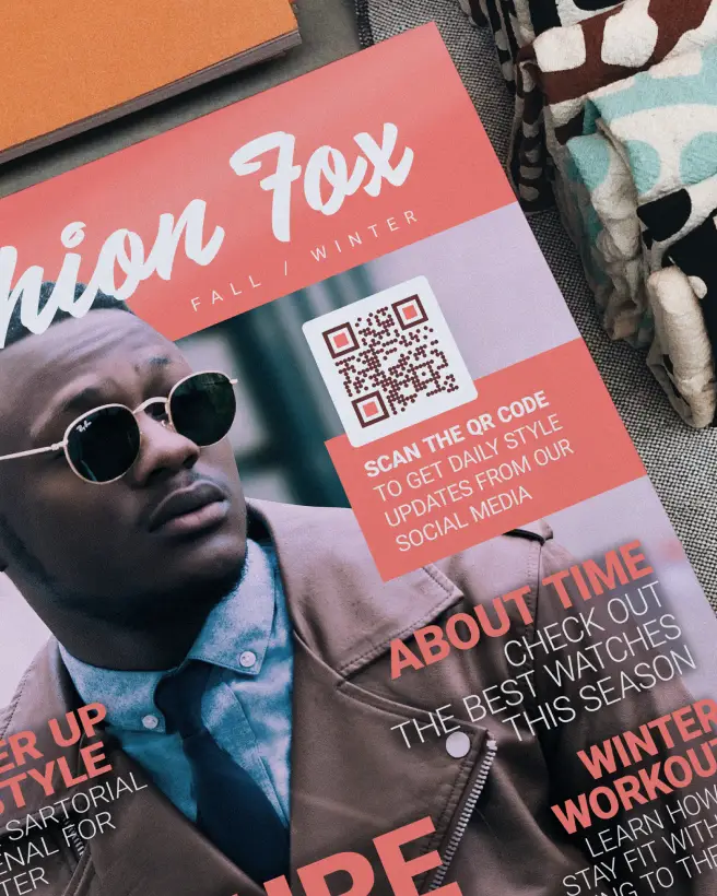 The cover of a fashion magazine featuring a QR Code that links to social media profiles.