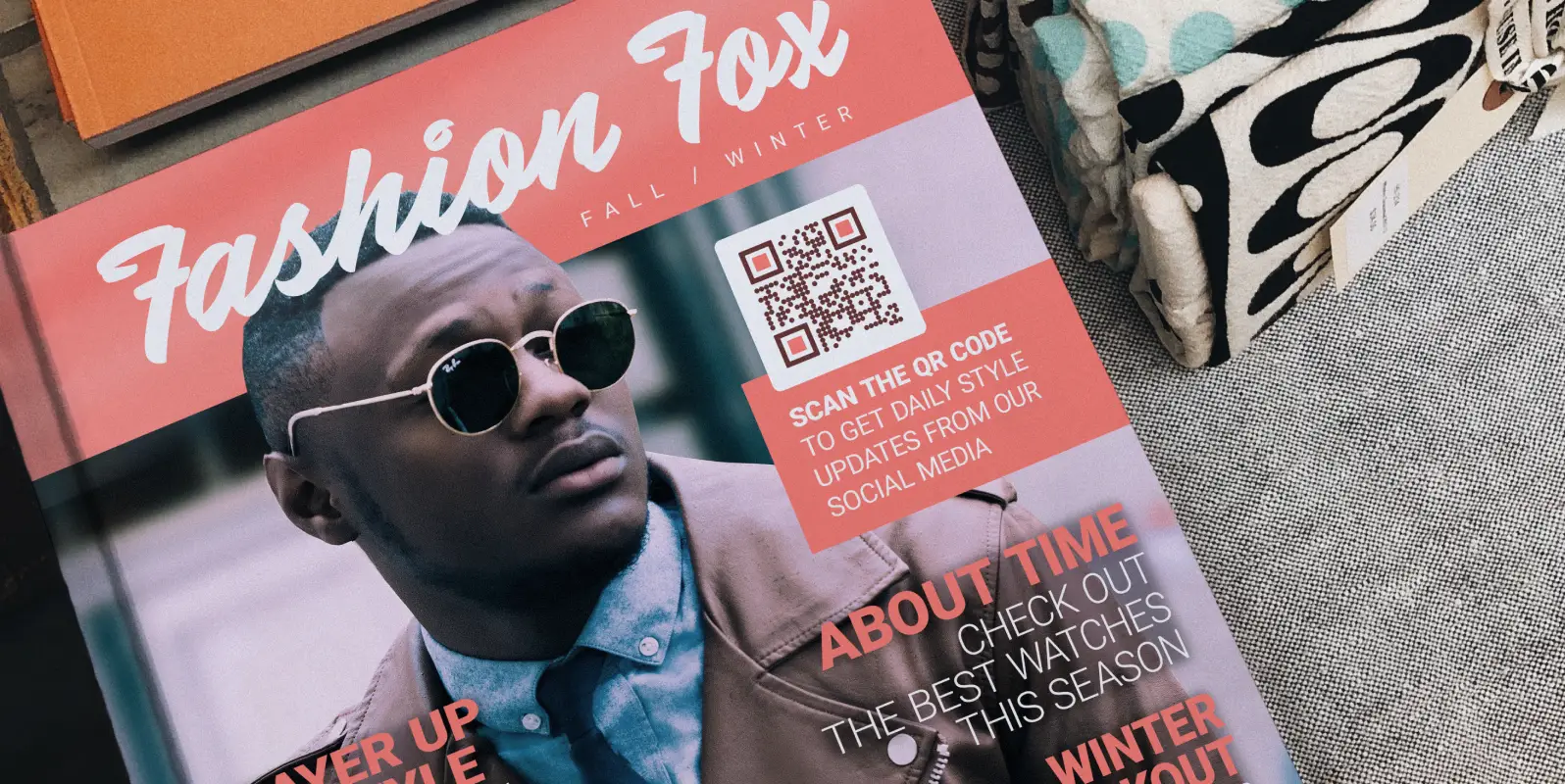 The cover of a fashion magazine featuring a QR Code that links to social media profiles.