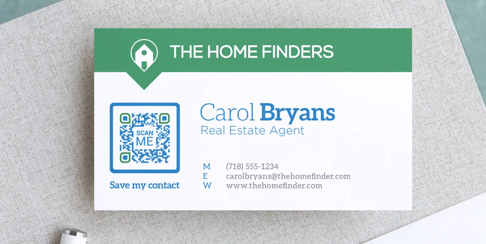 A business card for a real estate agent. It features a QR Code that can be scanned to save contact information.