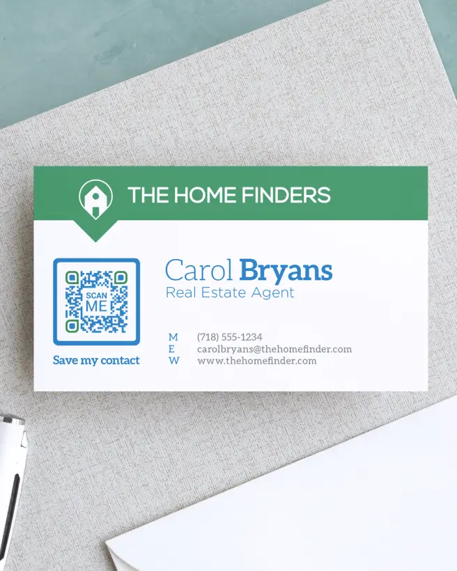 A business card for a real estate agent. It features a QR Code that can be scanned to save contact information.