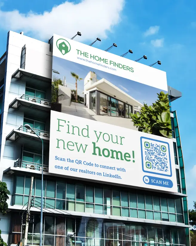 A very large advertisement on the side of a multi-story building. It includes a QR Code to connect with realtors on LinkedIn.
