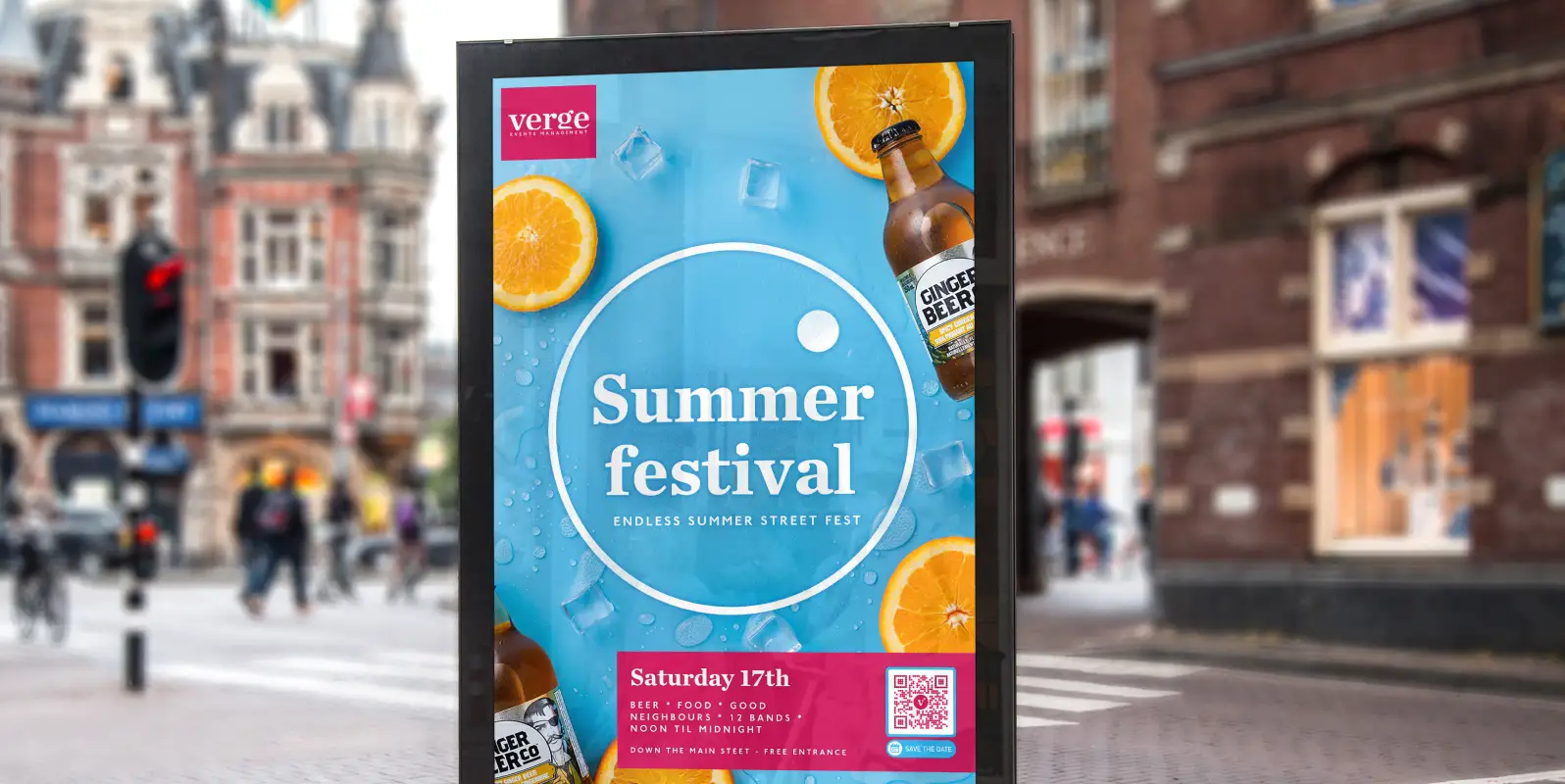 An outdoor advertisement for a summer festival. A QR Code is featured to save the date.