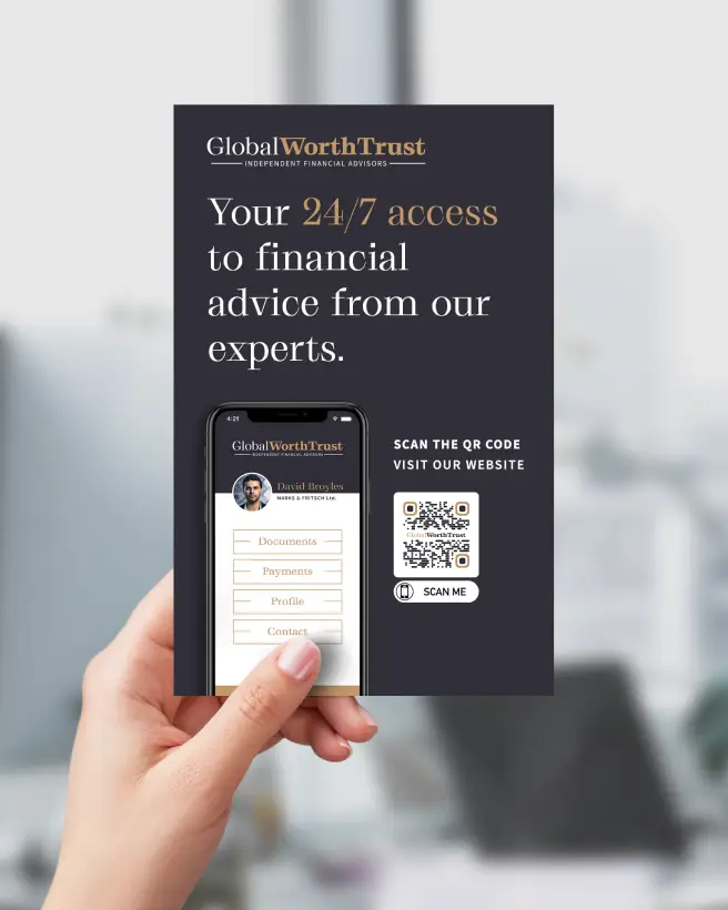 Hand holding a finance company's leaflet with a QR Code on it.