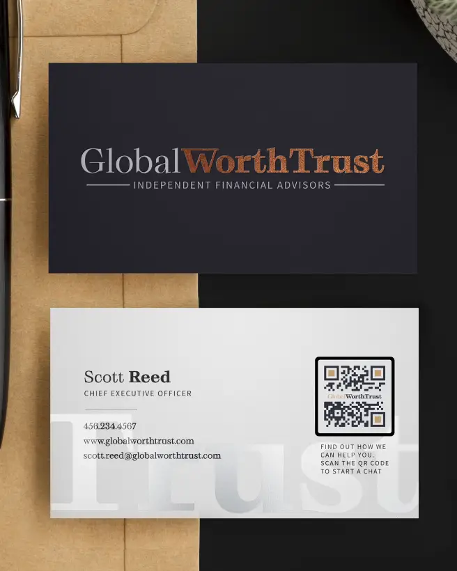 File folder with a pen, black business card front, and business card back showing contact details and QR Code on it.