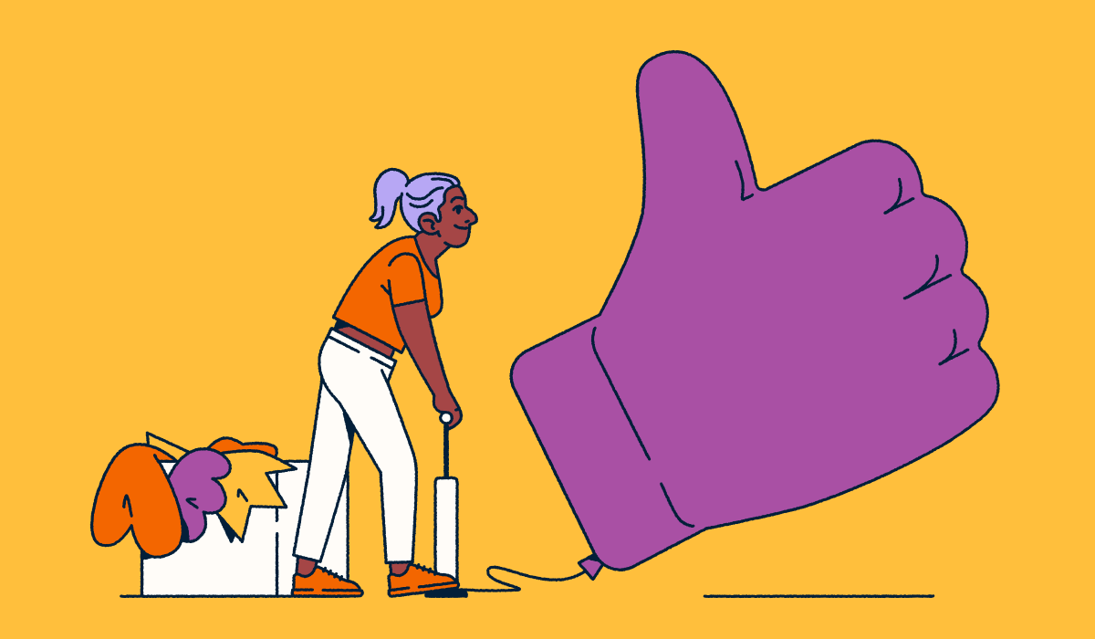 A customer inflating a massive 'like' emoji.