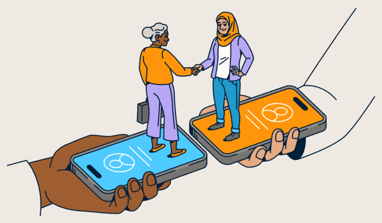 Two people standing on smartphones shaking hands.